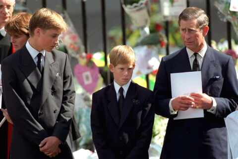 Following the tragic death of Princess Diana in 1997, Prince Charles and his sons William and Harry are seen here at her funeral.